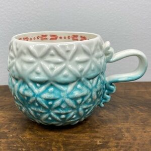 Anthropologie Coffee Mug Blue Marshmallow Ribbon 3D textured Abstract
